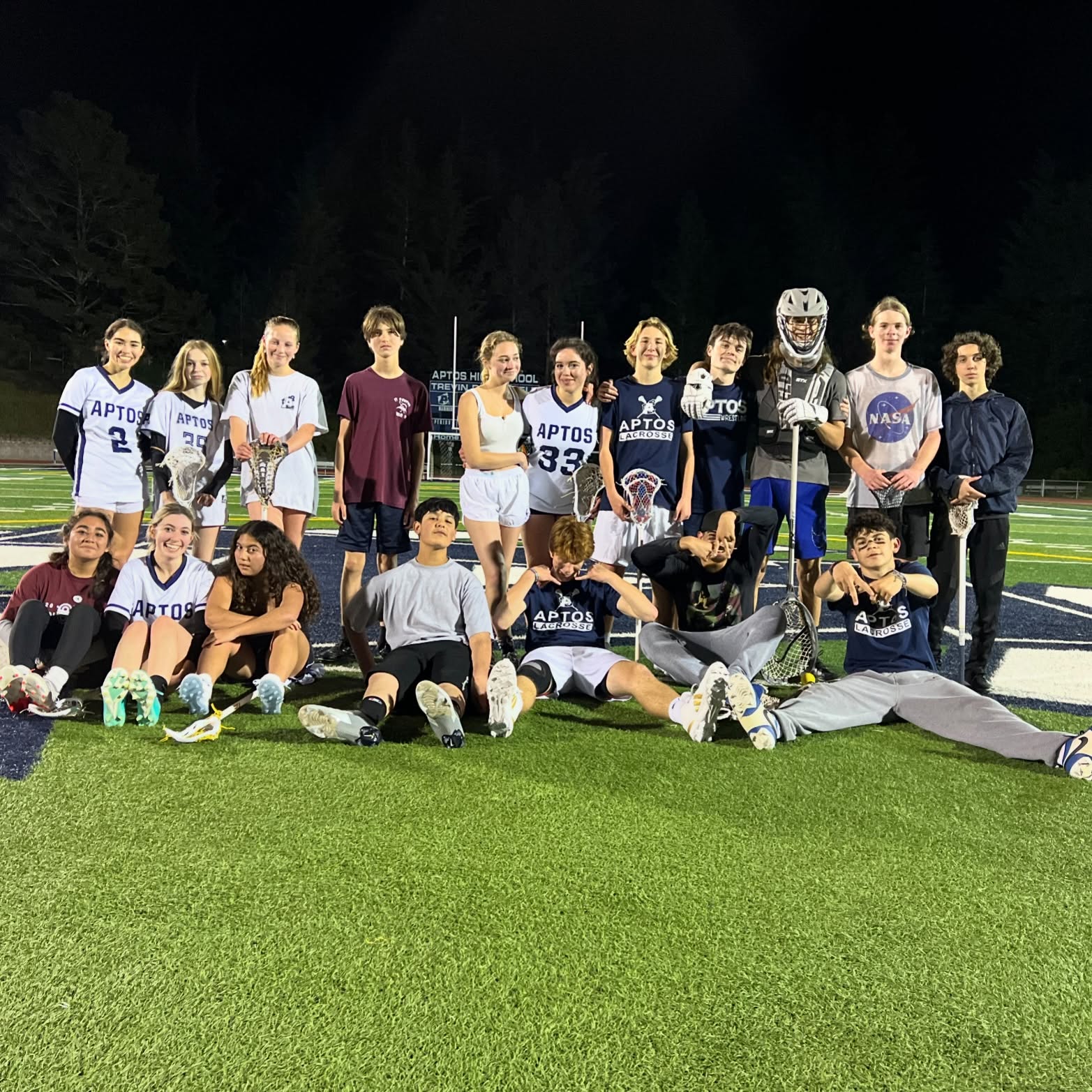 Team Photo Under the Lights