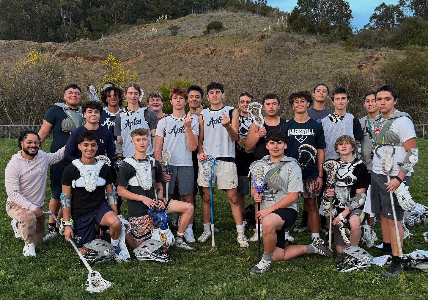 The 2025 Aptos Mariners pose for a team photo during preseason practice
