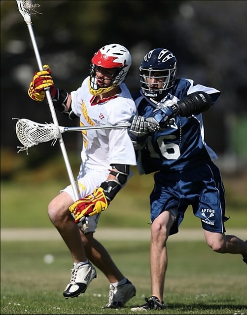 Aptos attackman dodges a Pacific Grove defender