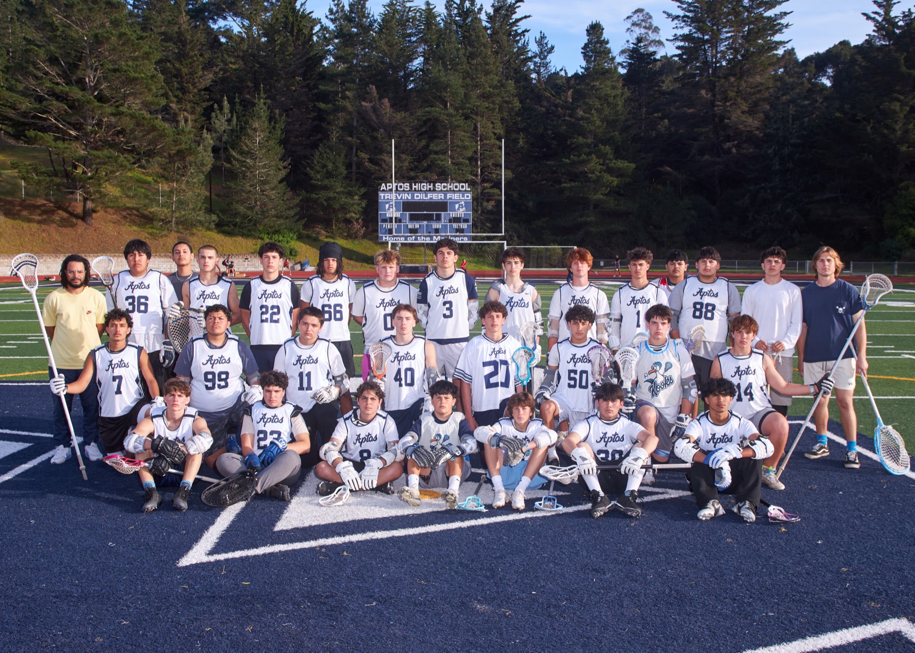 The 2026 Aptos Mariners boys lacrosse team poses at Trevin Dilfer Memorial Field — 29 players and 2 coaches