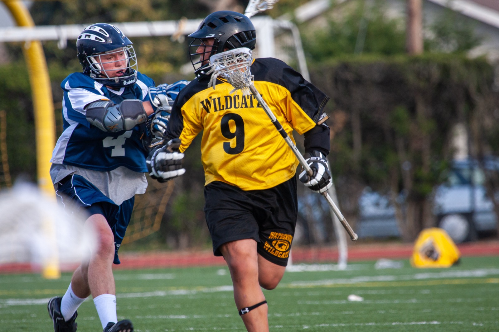Aptos player shoots on Watsonville goalkeeper