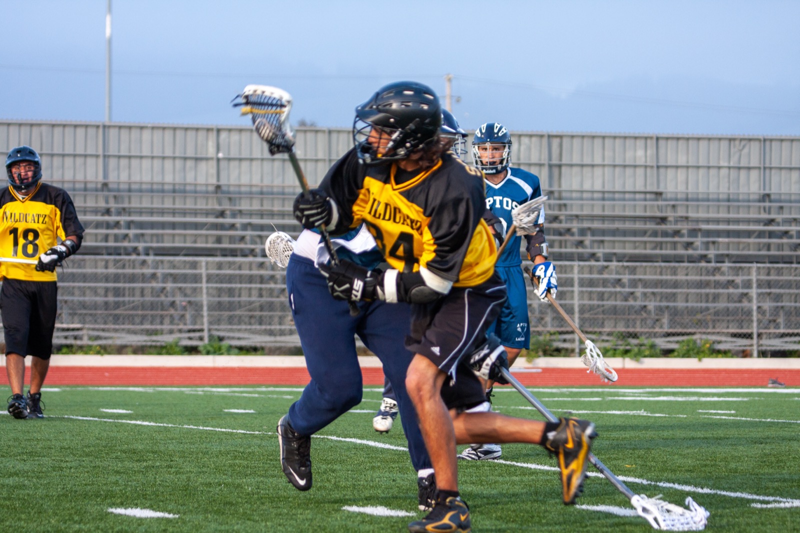 Aptos player dodges from behind the cage