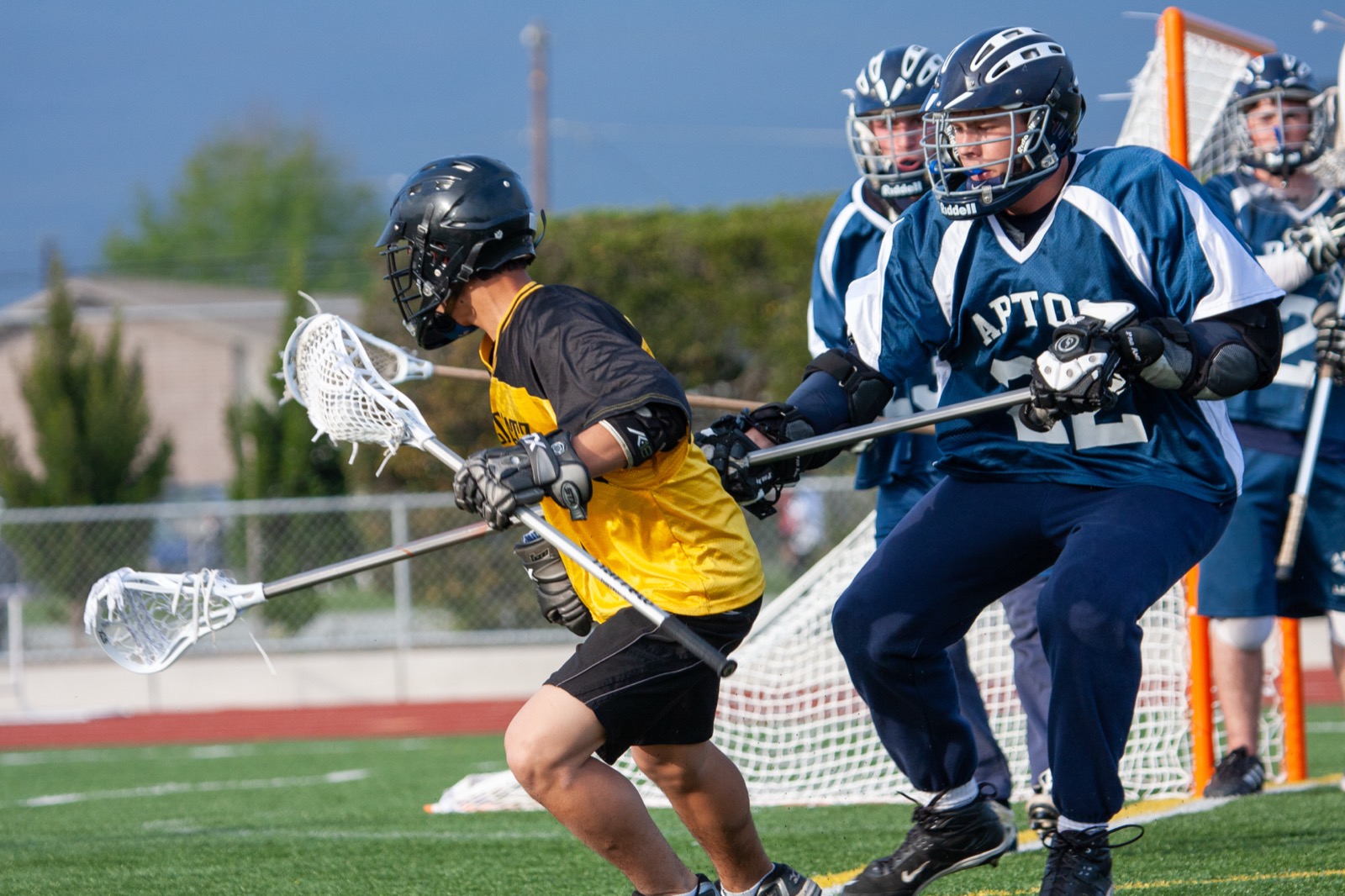 Aptos defender battles a Watsonville attacker in front of the goal, April 18, 2008